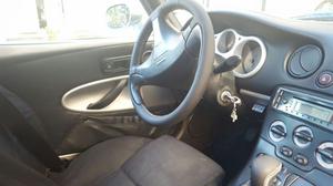 Fiat Barchetta grigia con capote nera